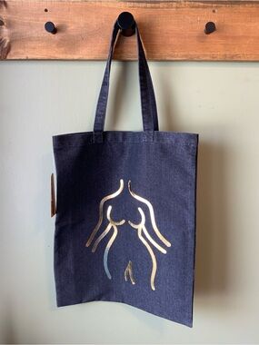 Golden Goddess
Handcrafted Dark Denim Tote Bag with Metallic Gold Touches